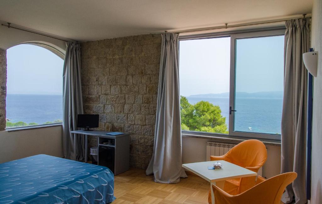 Hotel Arenella Giglio Porto Pokoj fotografie